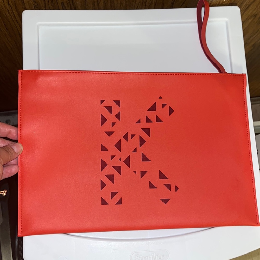 Kenzo perfumes wristlet